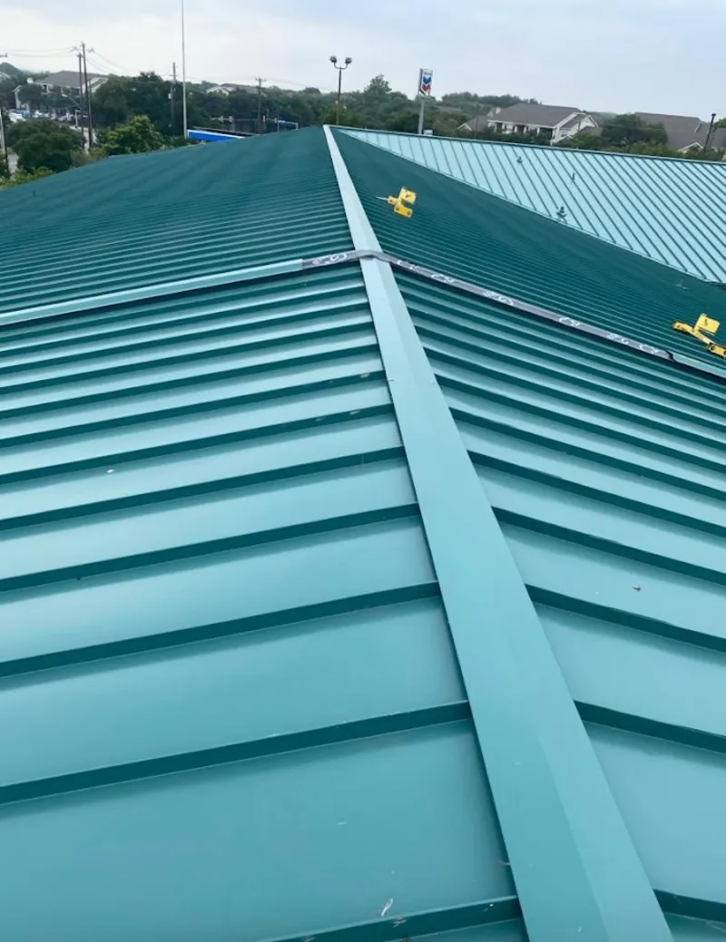 Green commercial metal roof ridge and valley for Metal Roof Repair in Tallmadge