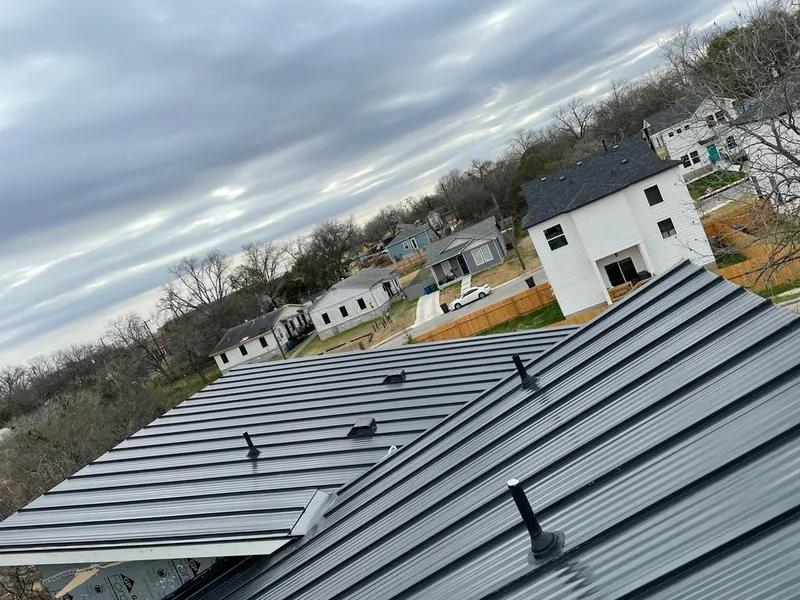 Standing seam metal roof panels with vents for Skylight Repair in Tallmadge